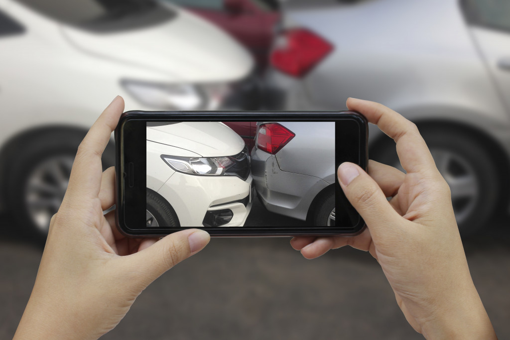 taking a photo of car accident