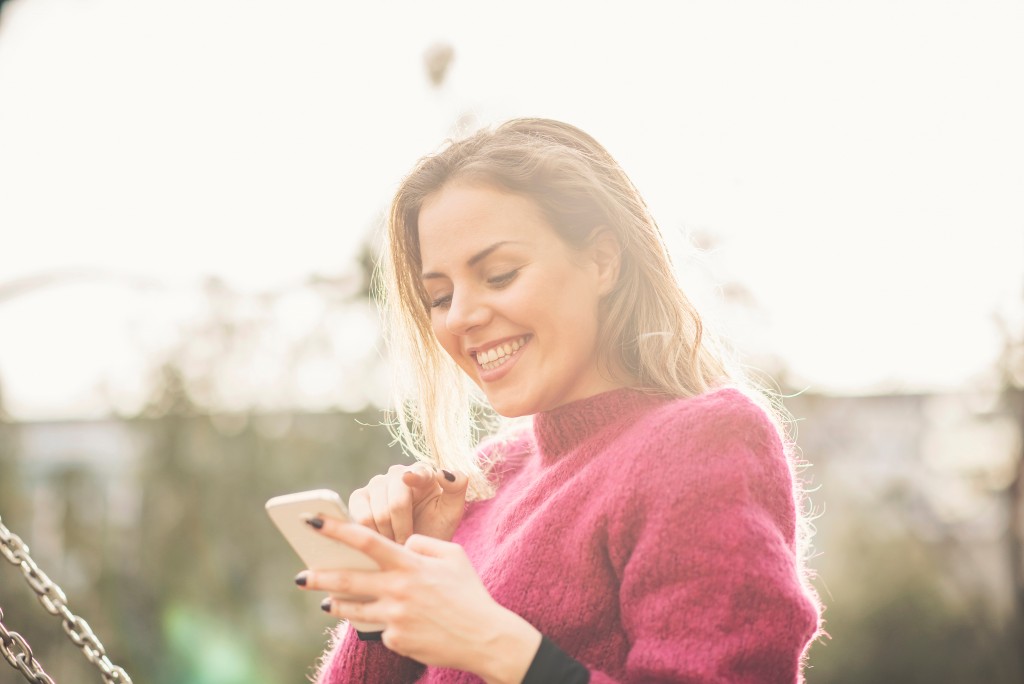 woman using her mobile phone